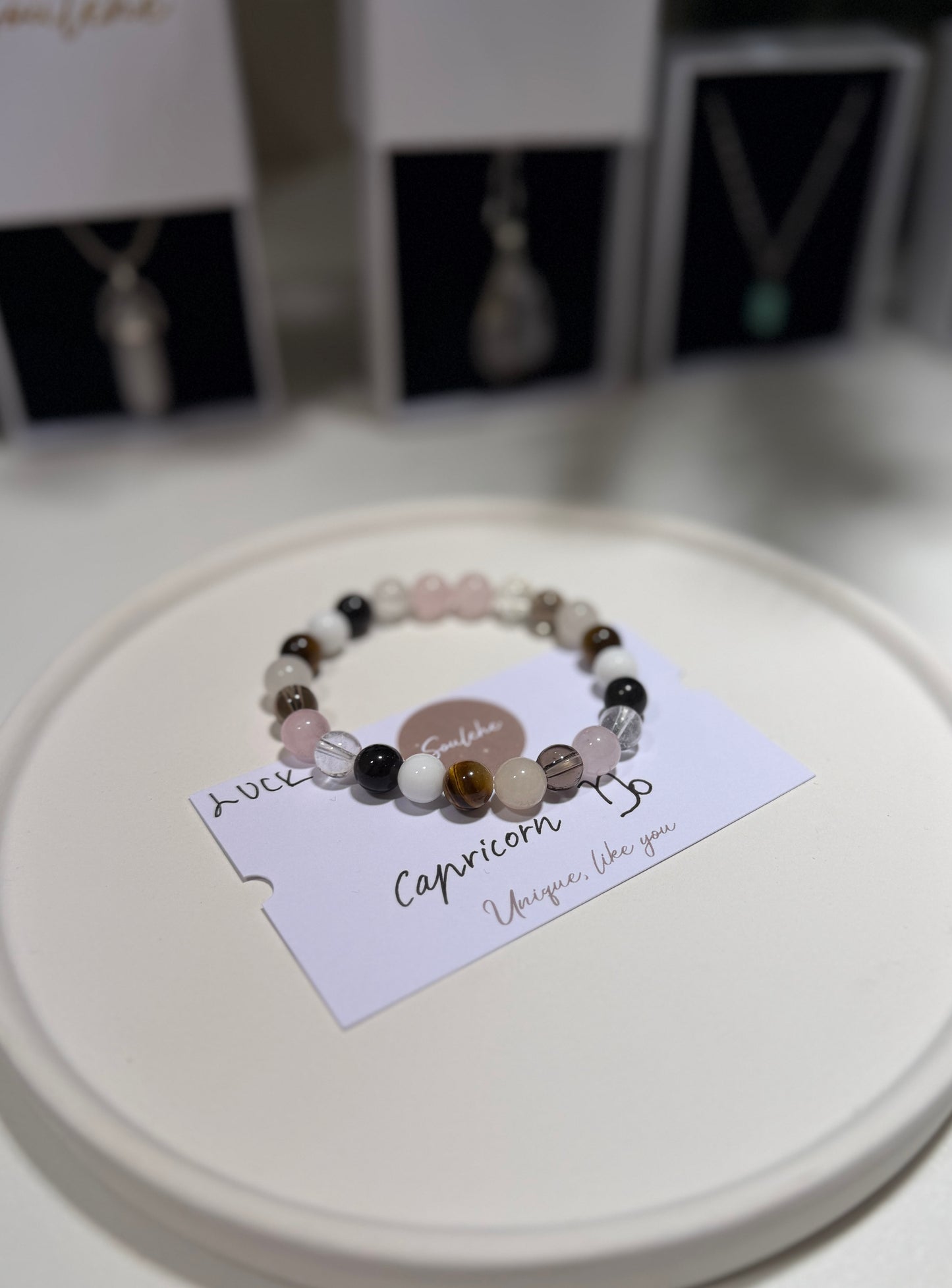 Capricorn Luck Bracelet with Rose Quartz, Obsidian, Clear Quartz, Tiger Eye, White Agate and Pink Aventurine, handmade – Soulehe.