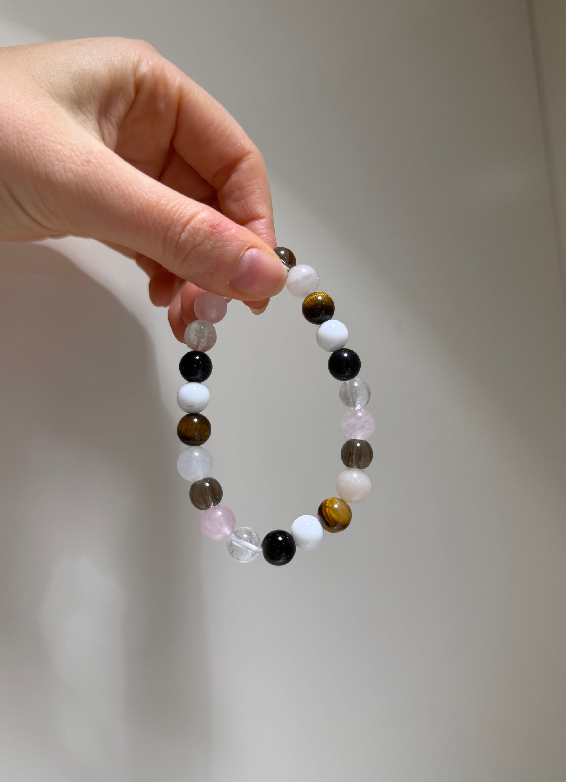 Capricorn Luck Bracelet with Rose Quartz, Obsidian, Clear Quartz, Tiger Eye, White Agate and Pink Aventurine, handmade – Soulehe.